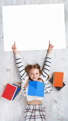 Cute girl reading colorful books. Learning and reading with fun - concept.