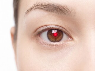 Obraz premium Conjunctivitis: Professional bright photography, portrait close-up of an eye (not clearly ill), a clean, bright red light reflection in the iris against a minimalist white background, high contrast, c