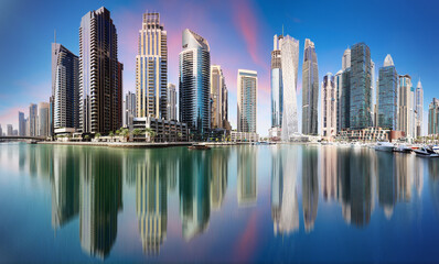 Fototapeta premium Sunset in Dubai Marina with skyscrapers, United Arab Emirates