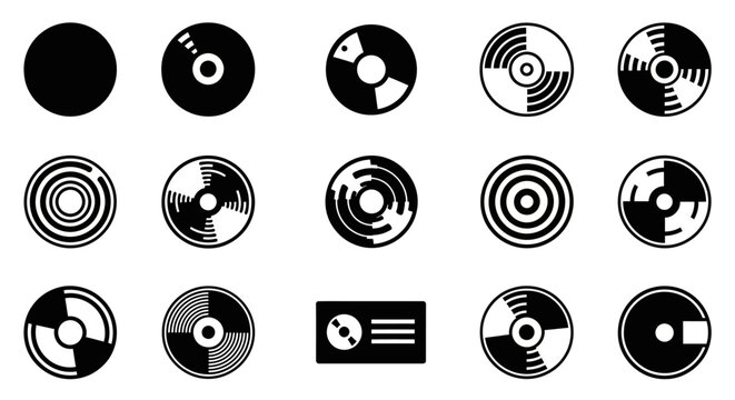 A collection of various vinyl records and CDs displayed together, showcasing different designs and patterns in a flat layout