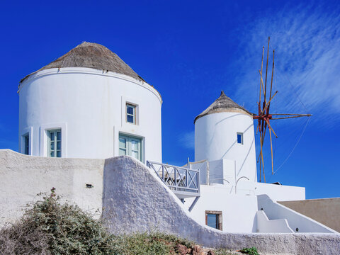 Windmills in Oia Village, Santorini or Thira Island, Cyclades, Greece