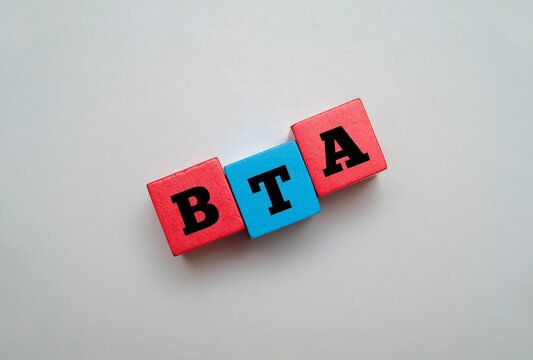Colorful block with text BTA. BTA acronym for Border Tax Adjustment. Concept for Border Tax Adjustment, carbon pricing, international trade regulations, and economic policy