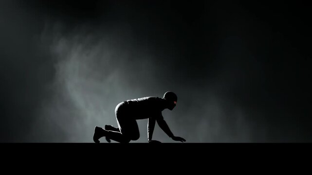 Silhouette of a man in black gear crawling through shadows. Stealthy intruder sneaking in the dark. Assassin movement for spy thriller and cinematic concept.