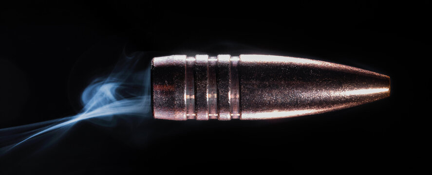 Real smoke behind a real bullet to emulate it flying