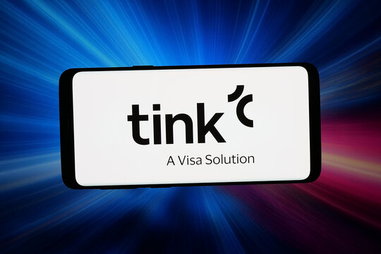 Stuttgart, Germany - 03-04-2026: In this photo illustration, the logo of banking services company Tink AB is displayed on a smartphone in front of abstract background on computer screen.