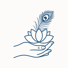Obraz premium Hand holding a blue peacock feather and lotus flower