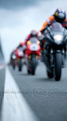 Blurred in motion: Motorcycle race with riders on sport bikes on asphalt track
