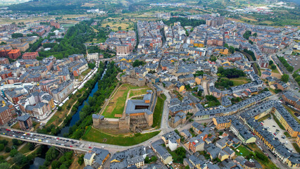 Aerial panoramic view of the city Ponferrada in Spain on a cloudy summer noon.