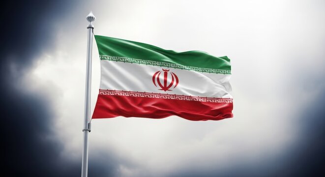 The iranian flag waving in the wind with a cloudy background
