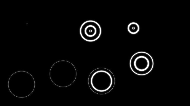 Looping circle burst animation with two to four concentric rings on transparent background, Circle blast animation, circle burst line shape,&nbsp;ellipse bursting on black screen background. 4k video