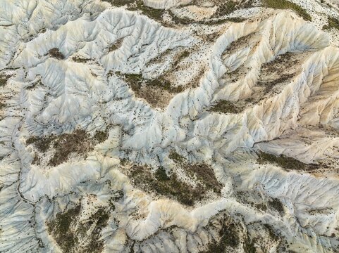 Bare ridges of eroded sandstone in the badlands of the Tabernas Desert, Europe's only true desert, aerial view, drone shot, Almer&iacute;a province, Andalusia, Spain