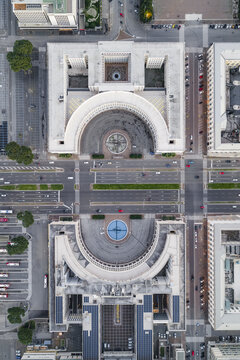 Aerial view of architectural symmetry and urban geometry, where classical facades meet modern transport in a dance of light and shadow, Rome, Lazio, Italy.
