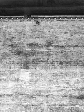 Aerial view of ancient brickwork under the soft light of the Roman sun, revealing textures of history and time etched into every stone, Rome, Lazio, Italy.