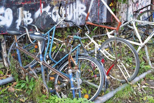 Junkyard, damaged bicycles in public space, Cologne, North Rhine-Westphalia, Germany