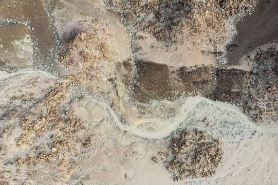 Dried up rivers after years of drought, overgrown with resistant shrubs, aerial view, drone image, Kaokoland, Kunene region, Namibia.