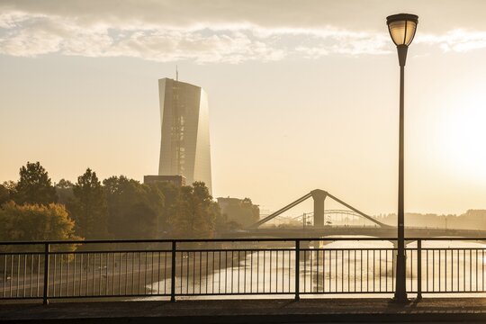 Bridge with lantern, high-rise building behind, European Central Bank in the morning light, Main with raft bridge, Frankfurt am Main, Hesse, Germany