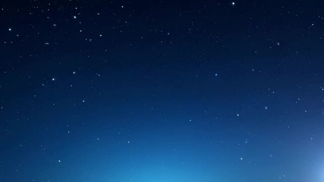 Night sky with stars and a blue gradient background at dusk or dawn