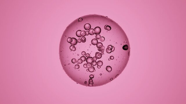 Transparent 3D liquid droplet with suspended inner drops over pink background, seamless abstract animation perfect for skincare, cosmetic oils, serums, and futuristic wellness visuals