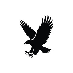 Obraz premium A striking silhouette of an eagle in mid flight wings fully extended