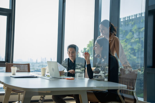 Collaboration meeting among professionals modern office business discussion urban environment close-up view teamwork dynamics