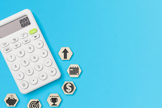 Savings goal strategy concept with calculator and icons