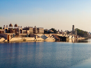 Kota Riverfront architecture along Chambal River with domed pavilions, ghats and long promenade reflecting on water, Kota Rajasthan waterfront tourism landmark urban cityscape © Dheeresh