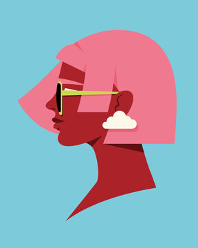 Portrait of a woman wearing cloud earrings and sunglasses