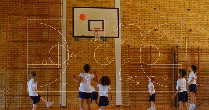 Playing kids in white Ts navy shorts reaching for basketball above hoop in school-gym, X or O overla