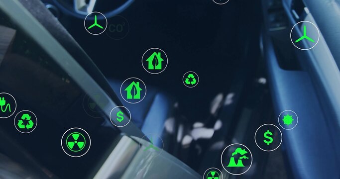 Displaying car front seat, console and steering showing leather and floating eco icons in cabin