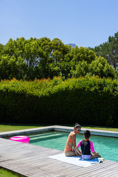 Sun warming adult and youth dipping feet in pool for cooling, animated tags highlighting shades ads