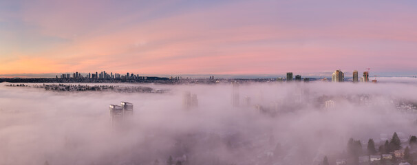 Sunrise Fog Over Burnaby Skyline With Pastel Skies in Greater Vancouver, BC, Canada