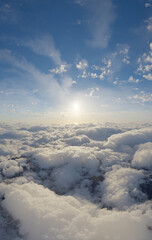 Naklejka premium Sunrise Above Puffy Clouds Over a Vast Blue Sky — Atmospheric 3D Rendering Scene