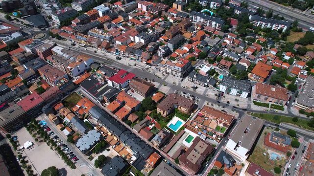 Aerial panorama view of the old town and city Collado Villalba in Spain on a sunny summer noon.