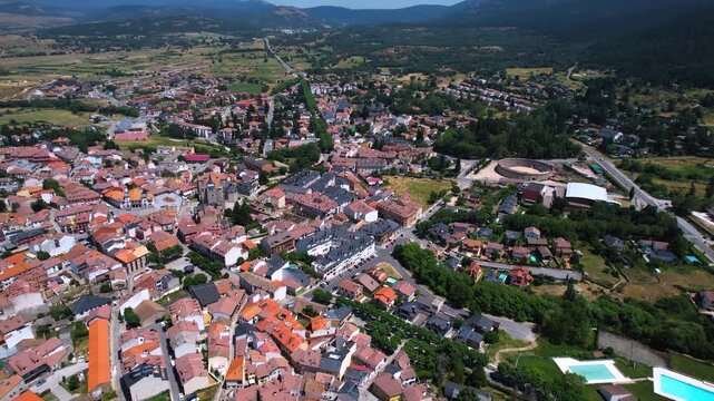 Aerial panorama view of the old town and city El Espinar in Spain on a sunny summer noon.