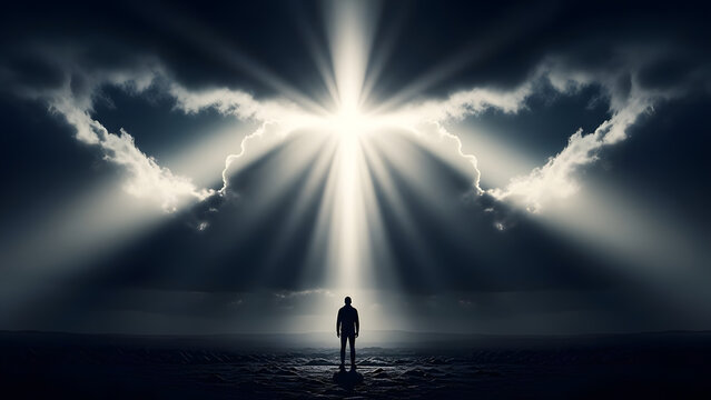 Man Standing Alone in Dramatic Landscape with Divine Light Rays Breaking Through Dark Clouds