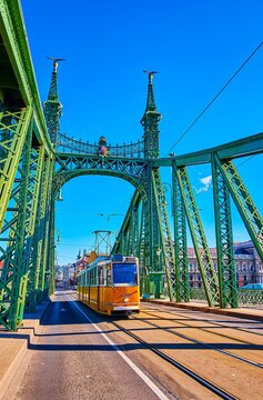 The retro tram on historic Liberty Bridge, Budapest, Hungary
