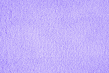 Soft purple texture with cozy fleece fabric ideal for warm and inviting backgrounds © reddish