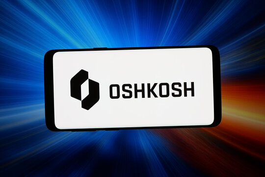 Stuttgart, Germany - 03-06-2026: In this photo illustration, the logo of US automotive company Oshkosh Corporation is displayed on a smartphone in front of abstract background on computer screen.