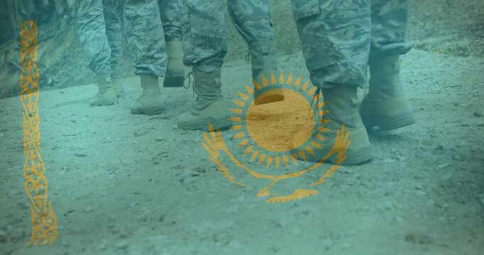 Soldiers boots marching on gravel, toes lifting starting cadence for drill, emblem overlaying legs