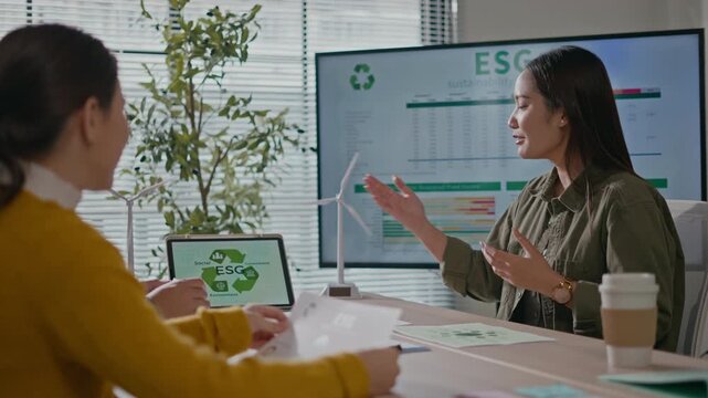 Environmental social governance esg officer working on project CSR process service,ESG transformation,recycle,Sustainable business practice.businesspeople talk ESG strategies risk management workshop