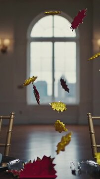 Vertical video: Appearing metal leaves drifting across arched window at table near place settings