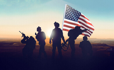 Obraz premium US soldiers stand together with an American flag during a conflict in Iran at sunset