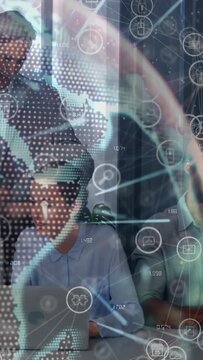 Vertical video: Woman at laptop starting dotted-globe icons, team grouping and consulting tech data