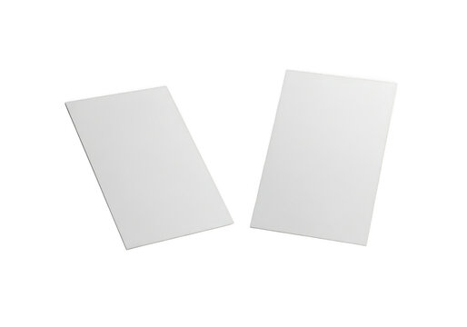 Two blank white business cards isolated on transparent background