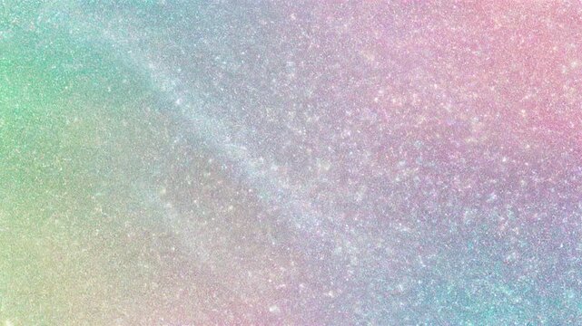 Shimmering pastel glitter glowing on an iridescent multicolored background