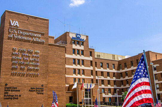 Poplar Bluff, MO &mdash; May 23, 2018: The John J. Pershing VA Medical Center operated by the U.S. Department of Veterans Affairs with American flags outside the main entrance.