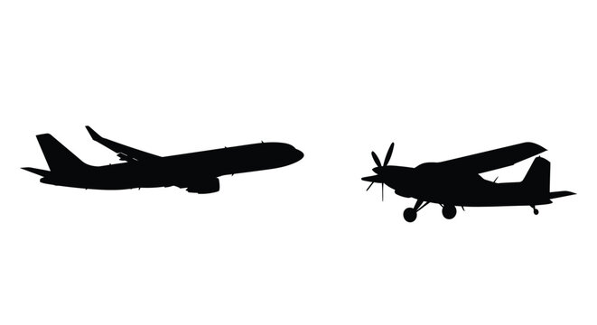 Two airplanes in flight a commercial jet and a bush plane silhouette