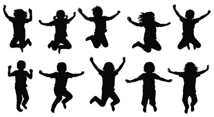 Joyful children jumping and playing a dark silhouette © mst