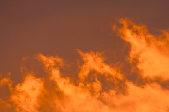 Abstract cloudscape at sunset with vivid colors