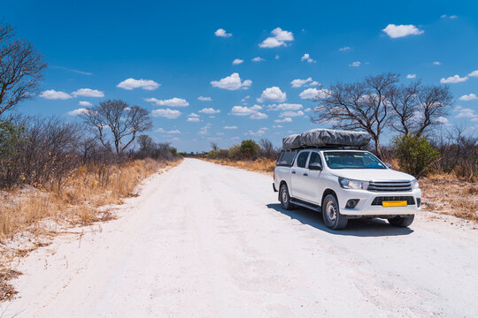 Off-road vehicle in Botswana's arid landscape